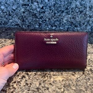 Kate Spade Pebbled Leather Wallet
Color:wine/burgandy